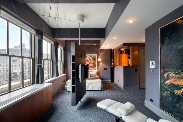 modern-bedroom-swivel-wall-divider.jpg